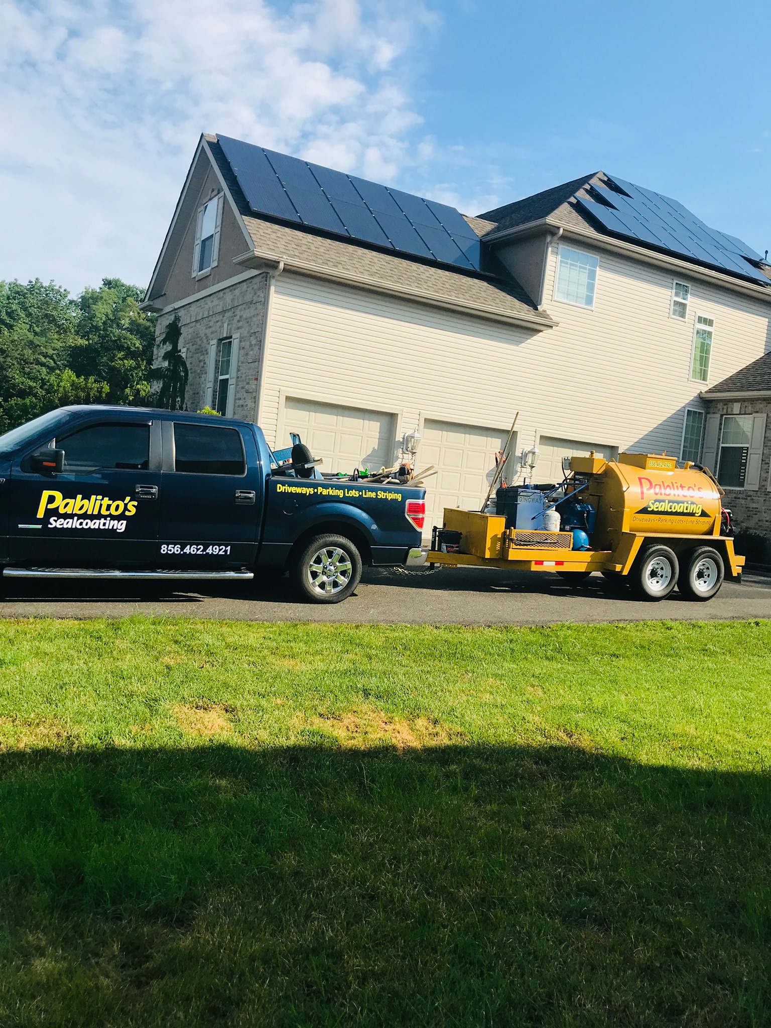Pablito's sealcoating truck and trailer at residential property
